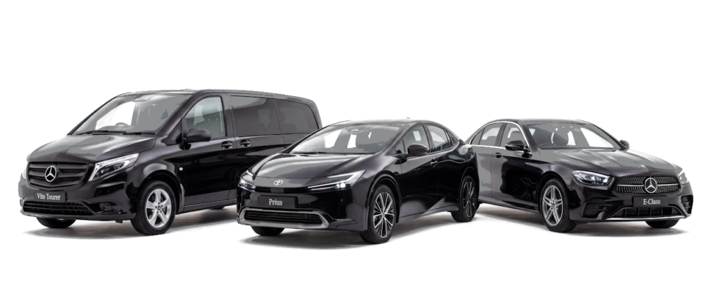 Black Toyota Prius, black Mercedes-Benz E-Class and black Mercedes-Benz Vito parked side by side