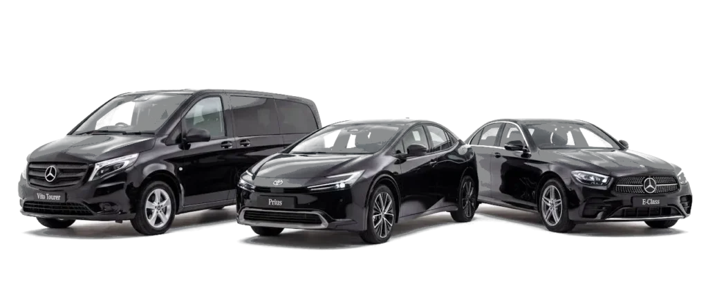 Black Toyota Prius, black Mercedes-Benz E-Class and black Mercedes-Benz Vito parked side by side